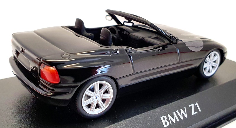 Amazon.com: Minichamps 1973 3.0 CSL Black with Red and Blue