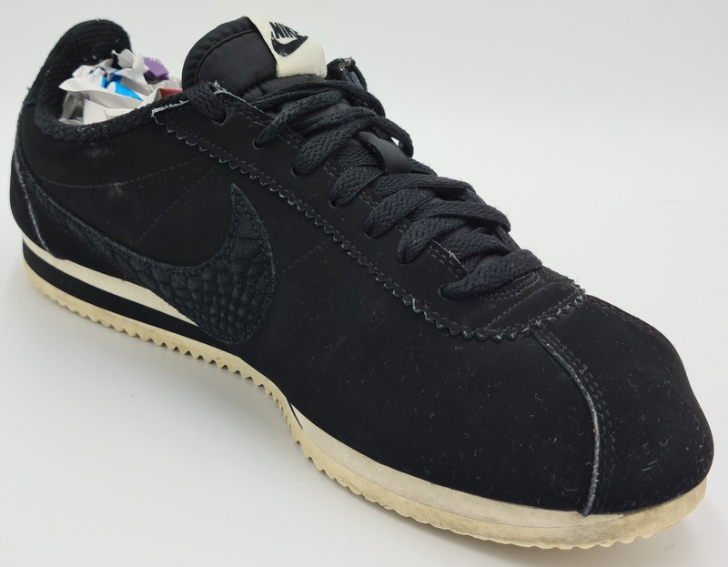 nike cortez black white suede
