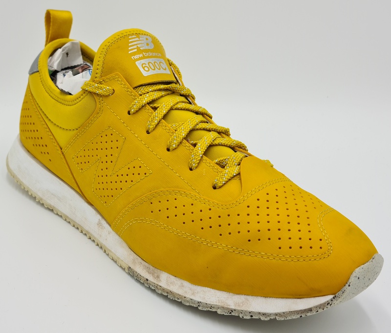 mustard new balance trainers