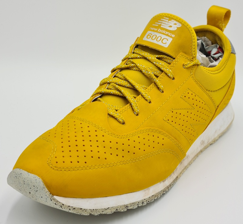 mustard new balance trainers