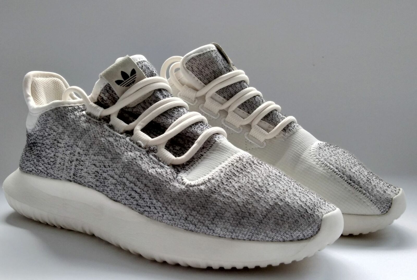 white adidas tubular trainers